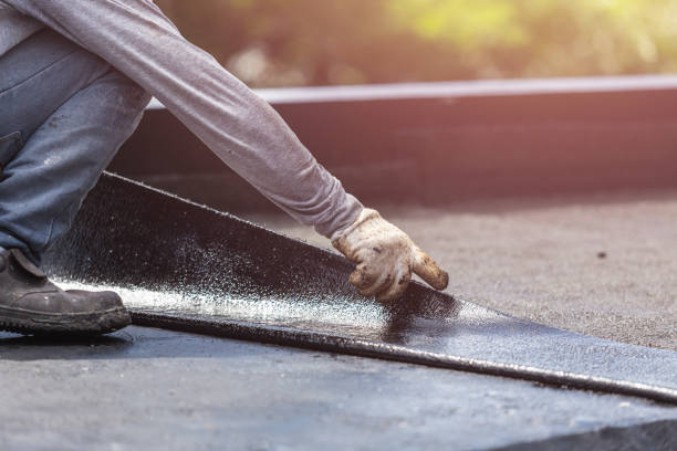 Professional Basement Waterproofing technician working in Milford, PA